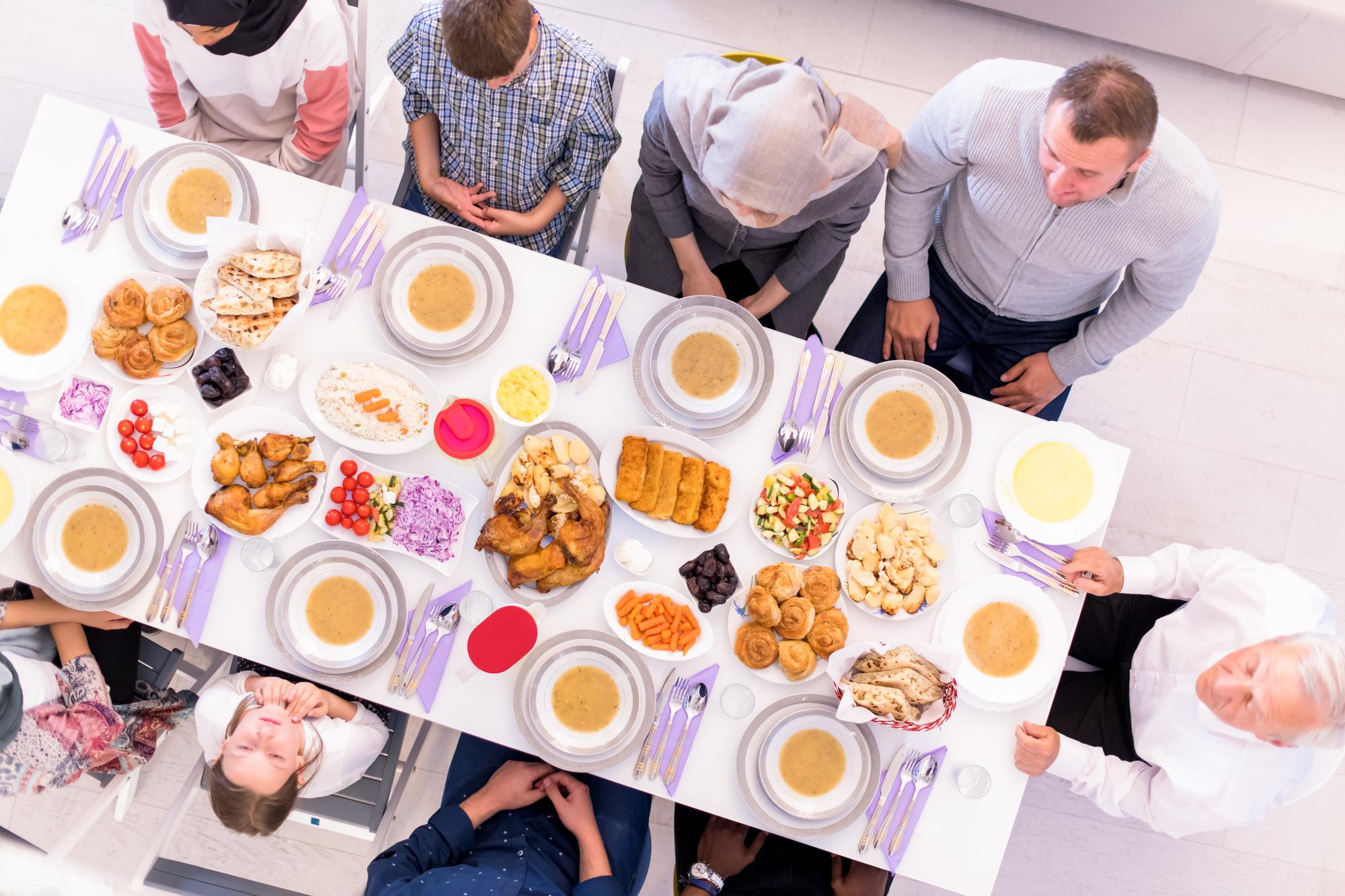 Participants tasting food around a table